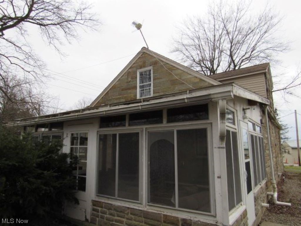 8528 Lafayette Road Lodi, OH 44254 - Photo 17 of 22 View of side of home with a sunroom