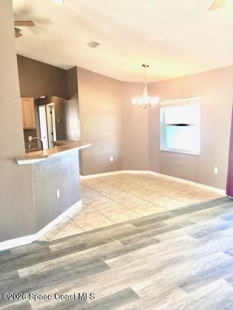 2033 Gloria Circle Palm Bay, FL 32905 - Photo 11 of 28 a view of a kitchen with a sink and a window