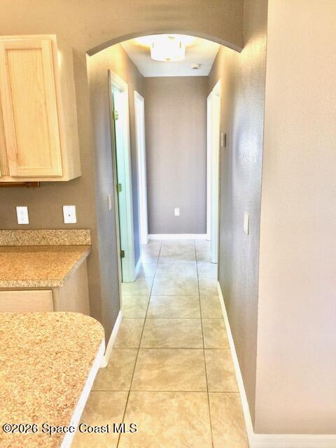 2033 Gloria Circle Palm Bay, FL 32905 - Photo 19 of 28 a bathroom with a sink and a mirror