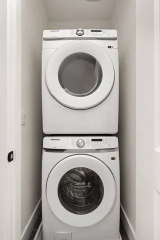 a utility room with dryer and washer