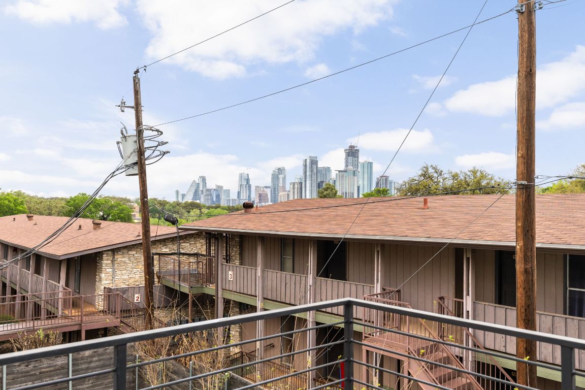 1402 Summit Street, Unit A Austin, TX 78741 - Photo 24 of 30 a backyard of a house with a fountain
