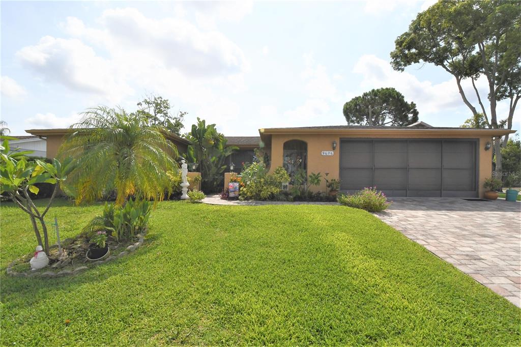9626 Mark Twain Lane Port Richey, FL 34668 - Photo 1 of 1 Welcome home to this corner lot!