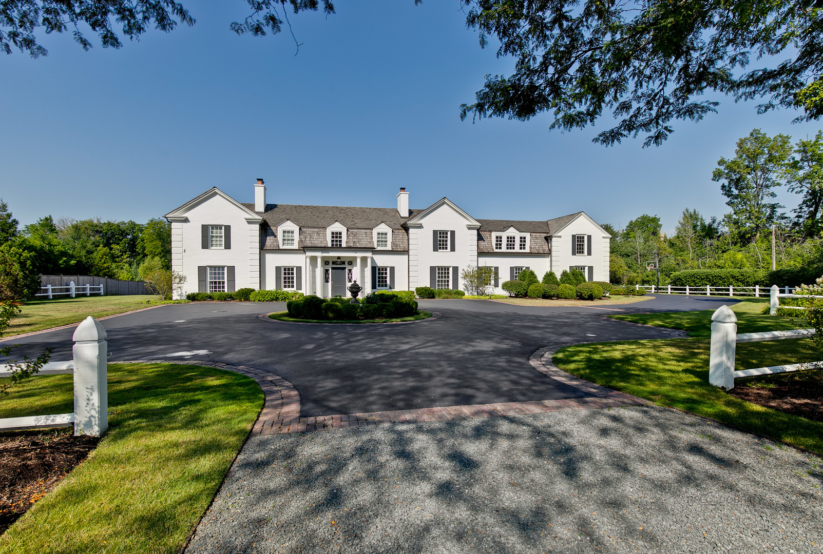 500 South Ridge Road Lake Forest, IL 60045 - Photo 1 of 54 a front view of a house with a garden