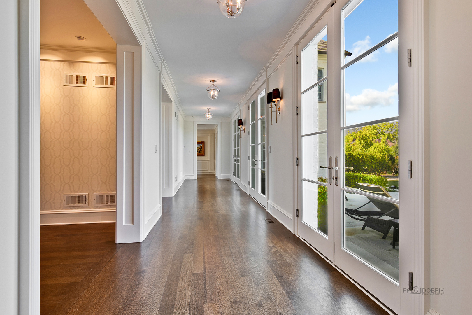 500 South Ridge Road Lake Forest, IL 60045 - Photo 12 of 54 a view of hallway with livingroom and wooden floor