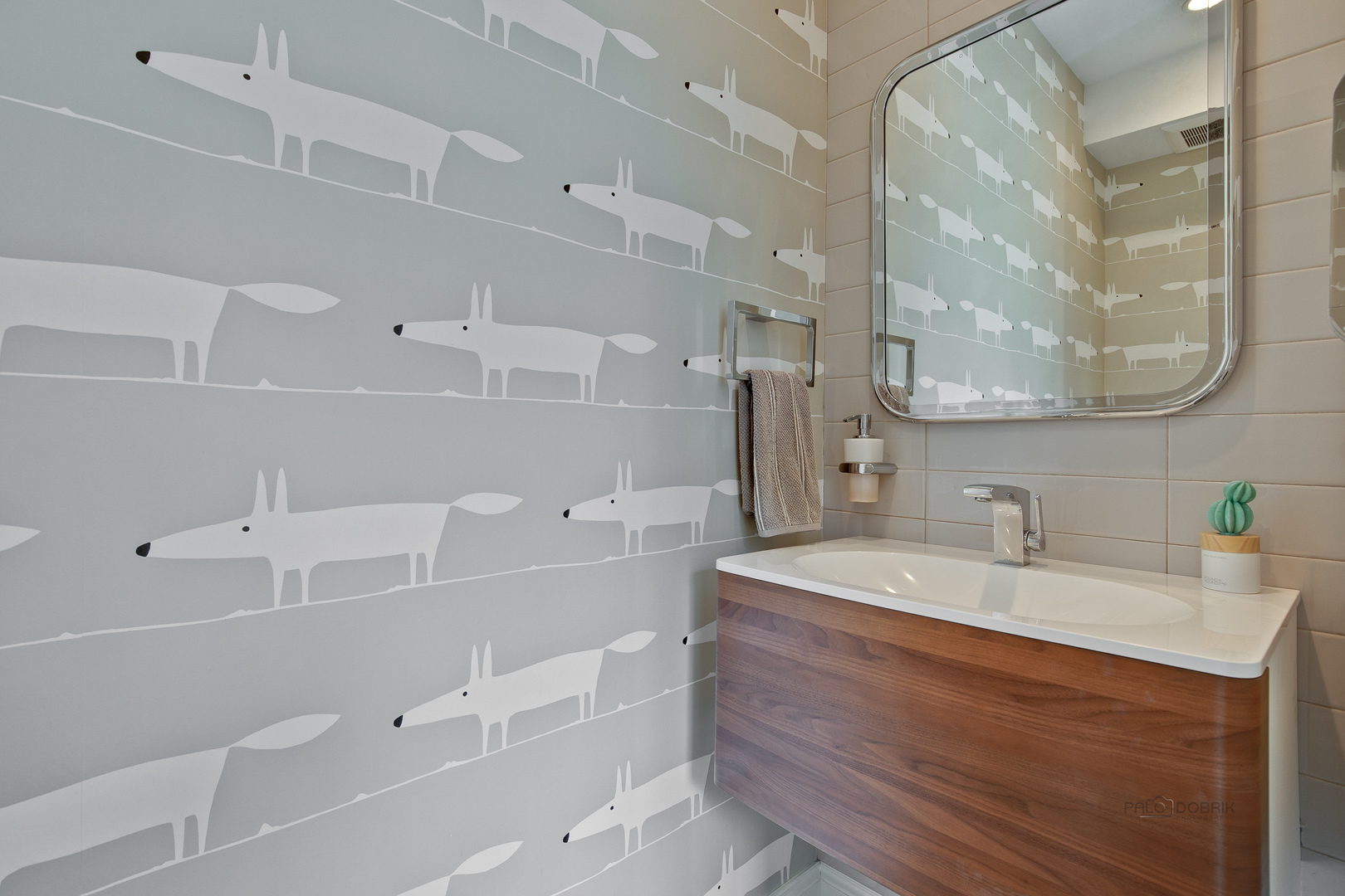 500 South Ridge Road Lake Forest, IL 60045 - Photo 14 of 54 a bathroom with a sink and a mirror