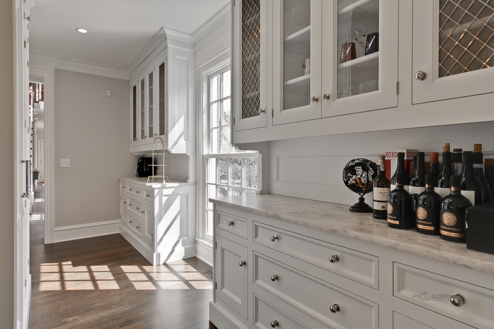 500 South Ridge Road Lake Forest, IL 60045 - Photo 22 of 54 a kitchen with white cabinets and window