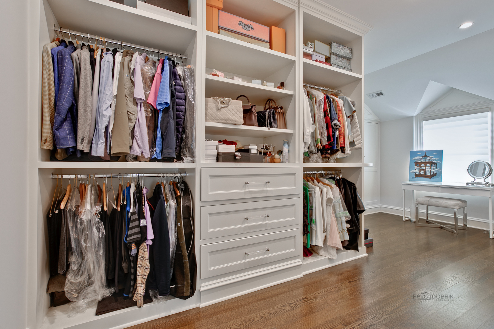 500 South Ridge Road Lake Forest, IL 60045 - Photo 38 of 54 a view of walk in closet with clothes and shoes