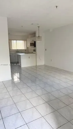 a view of kitchen and window