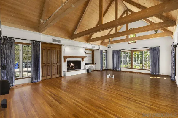 a kitchen with stainless steel appliances granite countertop wooden cabinets stove and sink