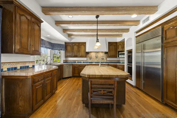 a view of a livingroom with wooden floor