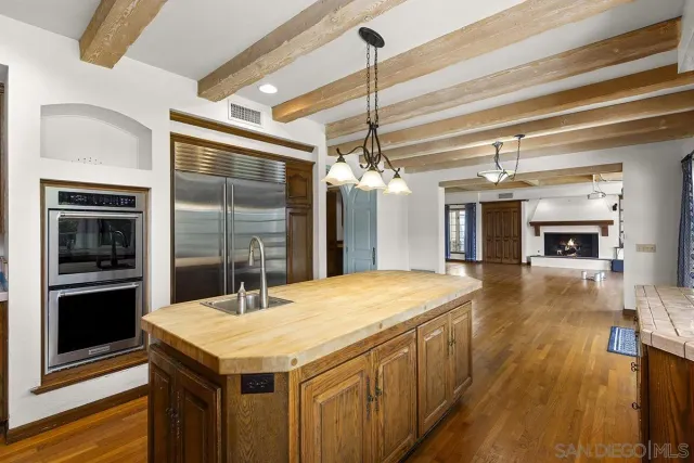 wooden view of walk in closet