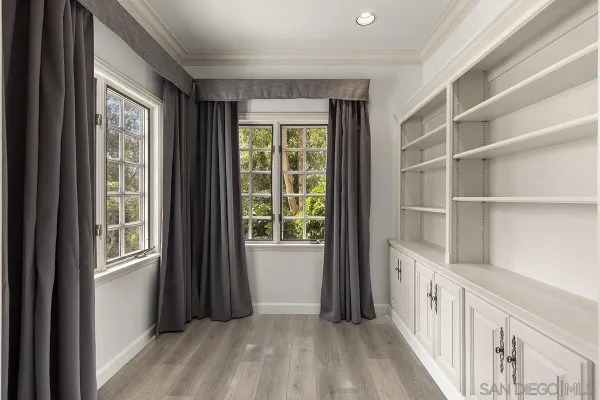 a bathroom with a shower and a bath tub