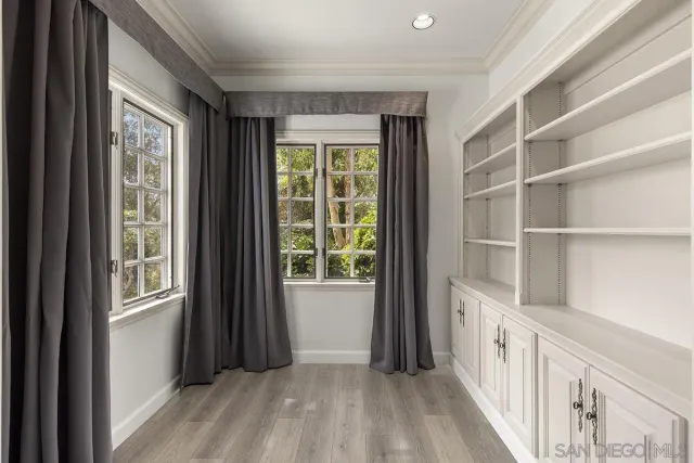 a bathroom with a shower and a bath tub