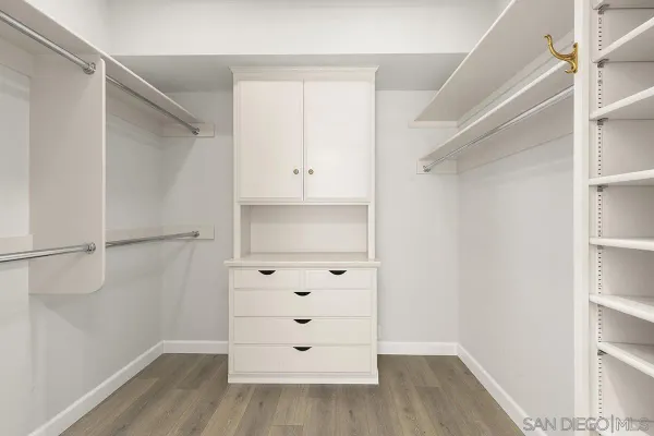 a view of a field with an trees