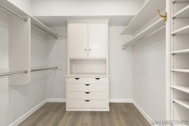 a view of a field with an trees