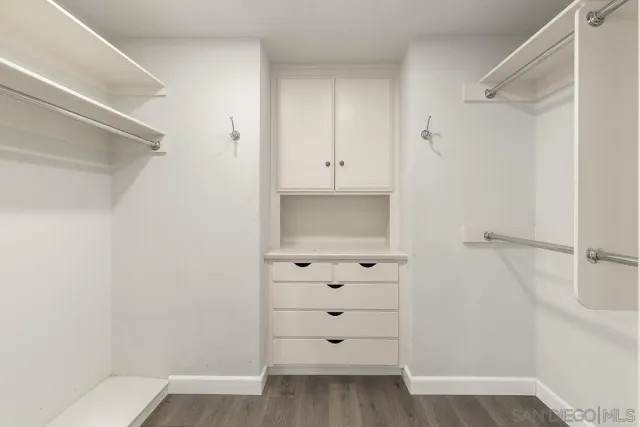 a view of a swimming pool with a yard