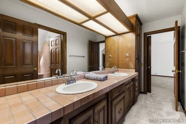 an aerial view of a house with a lake view