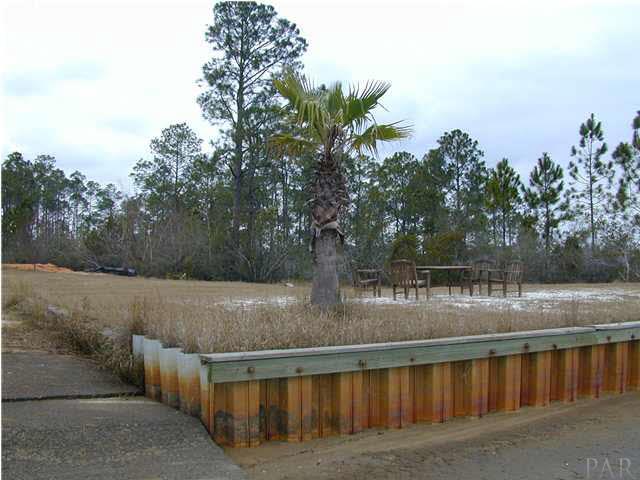 4032 Etta Road Milton, FL 32583 - Photo 6 of 9 the vinyl retaining wall at waters edge