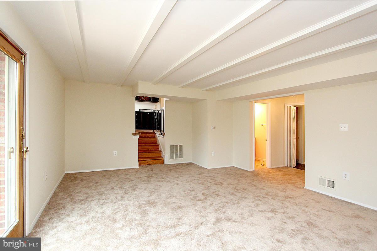 12917 Layhill Road Silver Spring, MD 20906 - Photo 17 of 30 an empty room with windows