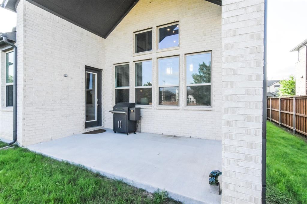 2516 Maidenhair Road Frisco, TX 75033 - Photo 29 of 30 front view of a house with a yard