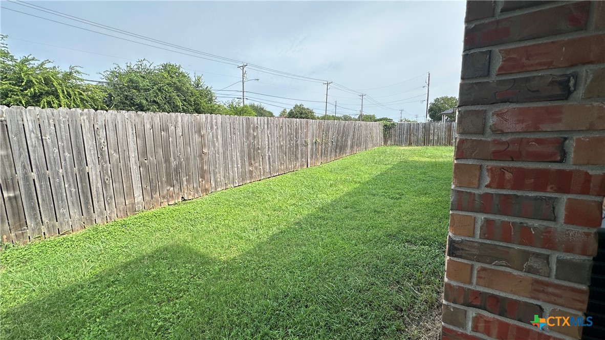 3209 Baldwin Loop, Unit A Killeen, TX 76549 - Photo 9 of 9 a view of a backyard with a plants