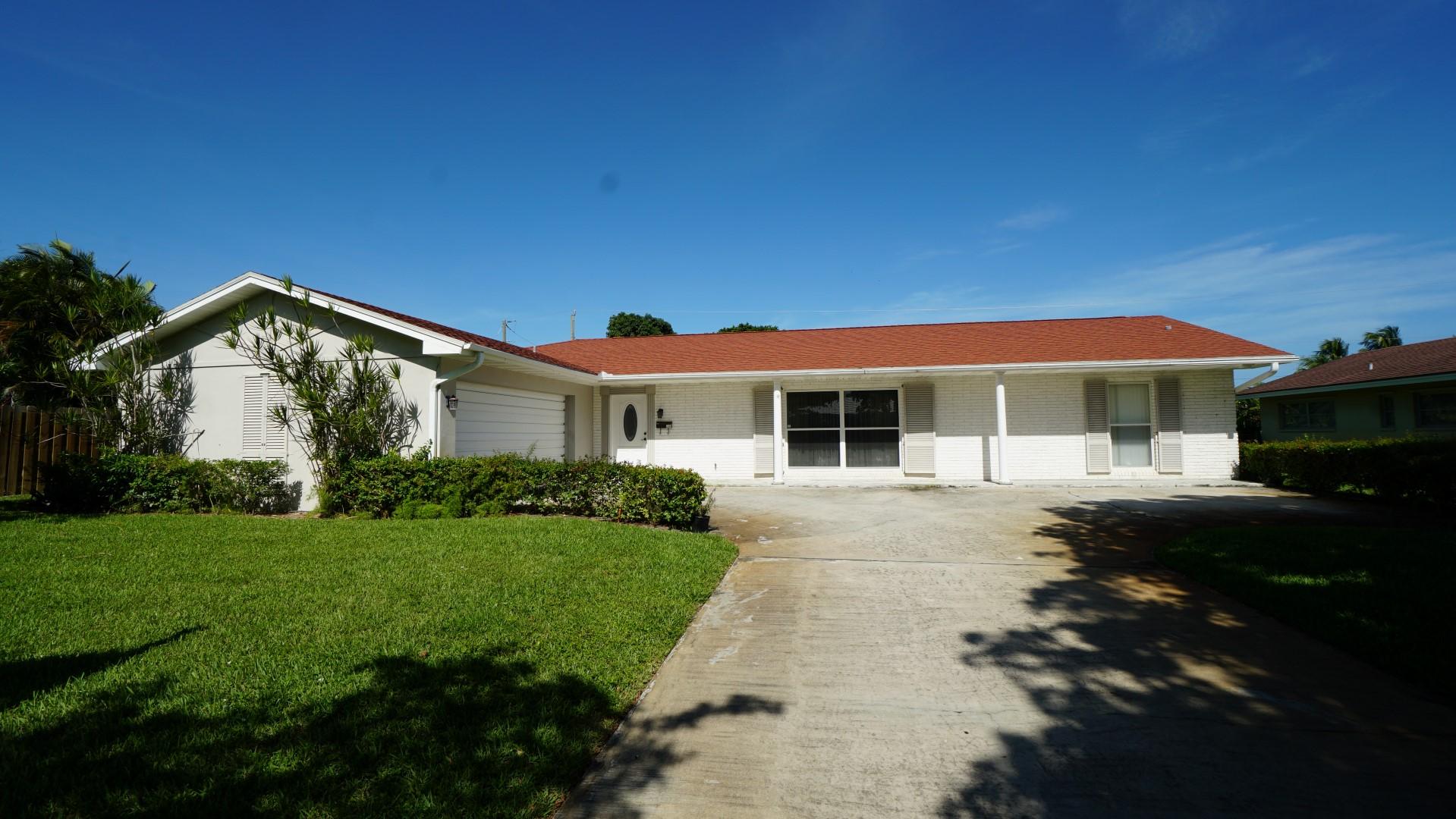 866 Fathom Road West North Palm Beach, FL 33408 - Photo 1 of 9 front exterior