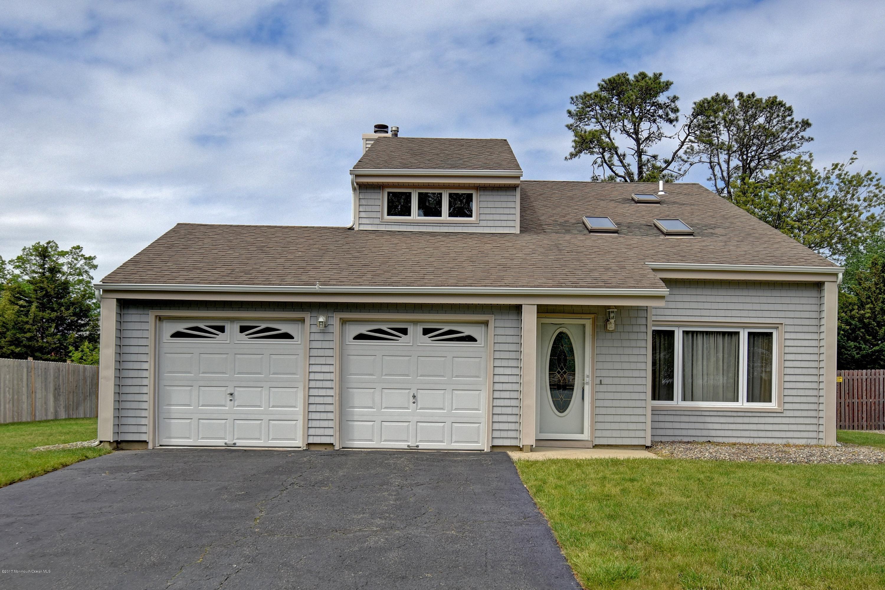 127 Reflection Road Toms River, NJ 08753 - Photo 1 of 20 front view of a house with a yard