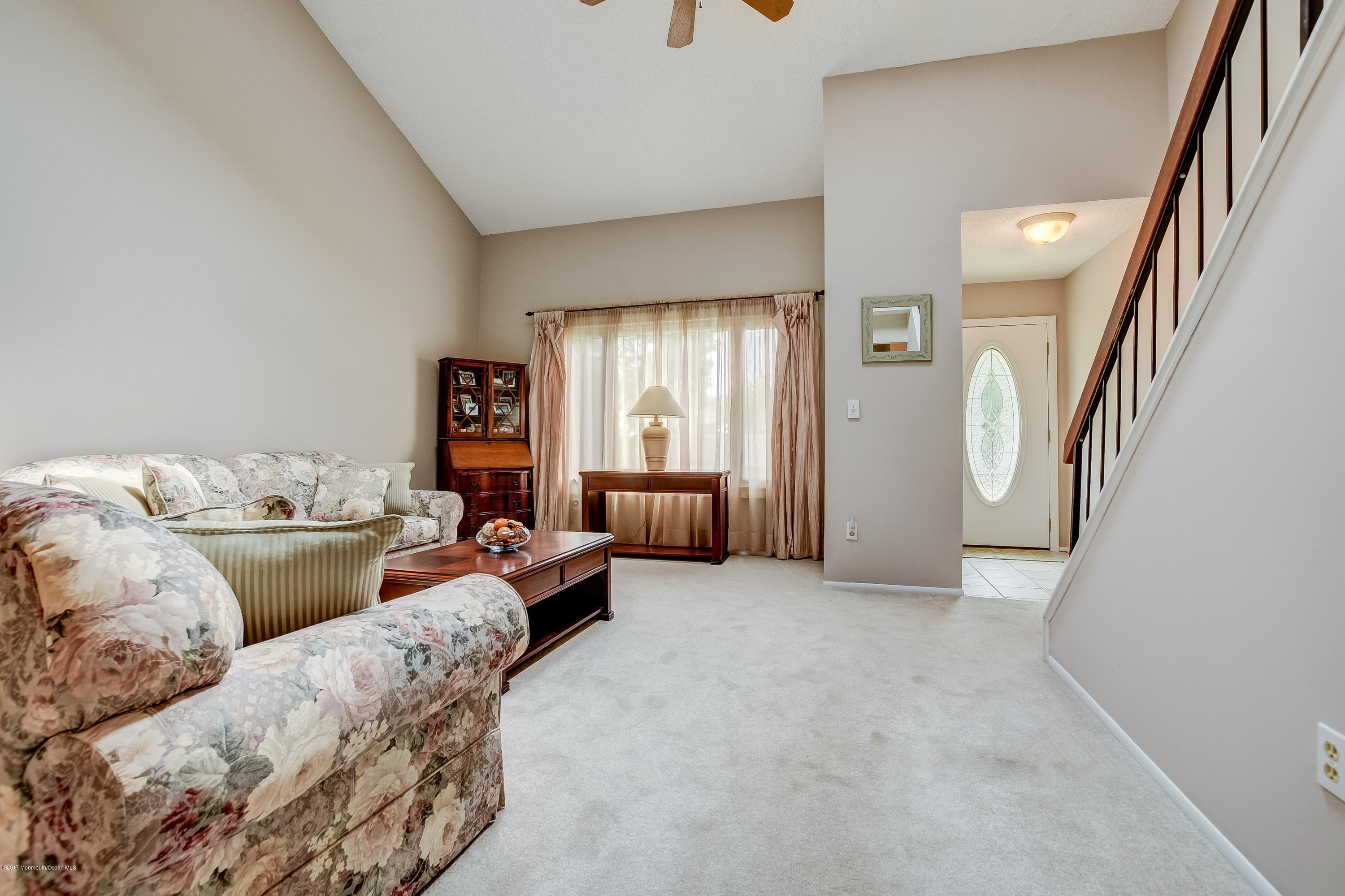 127 Reflection Road Toms River, NJ 08753 - Photo 4 of 20 a living room with furniture and a entryway
