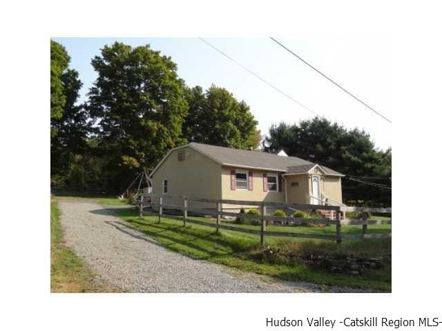 381 Oak Ridge Road Ellenville, NY 12428 - Photo 6 of 6 a house view with a garden