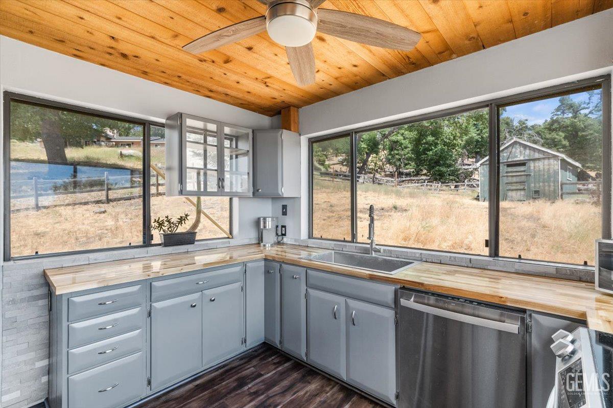Undisclosed Address Tehachapi, CA 93561 - Photo 11 of 30 a kitchen with a sink and large window