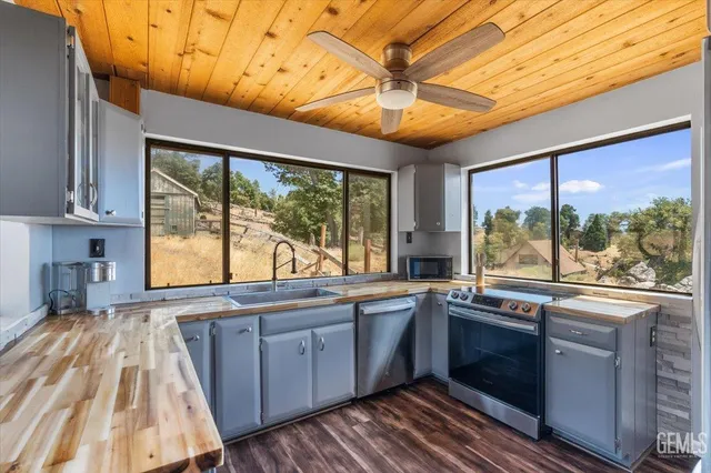 a large kitchen with a large window
