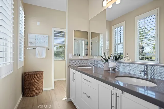 a view of a hallway with closet and a livingroom view