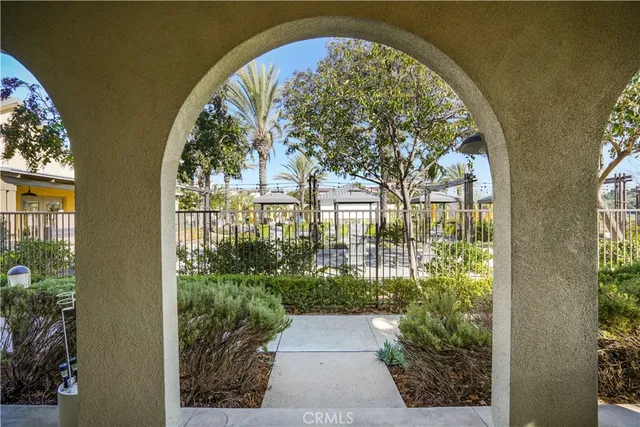 a view of a livingroom with furniture window and garden view