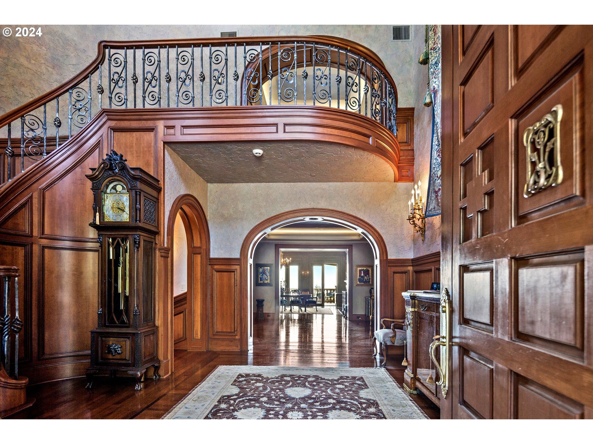 11223 Northwest Saltzman Road Portland, OR 97229 - Photo 12 of 46 a view of a brick house with many windows