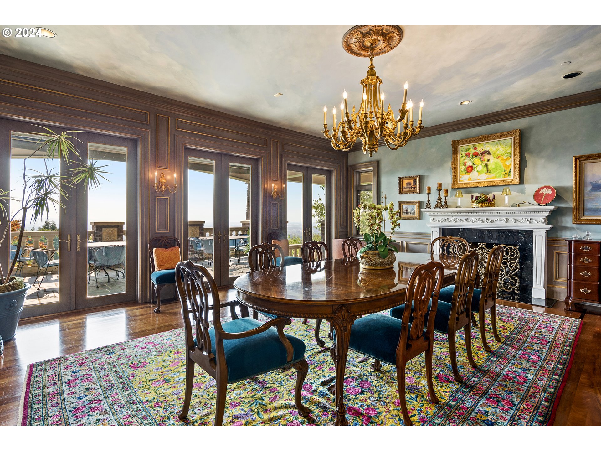 11223 Northwest Saltzman Road Portland, OR 97229 - Photo 17 of 46 a view of a dining room with furniture and chandelier