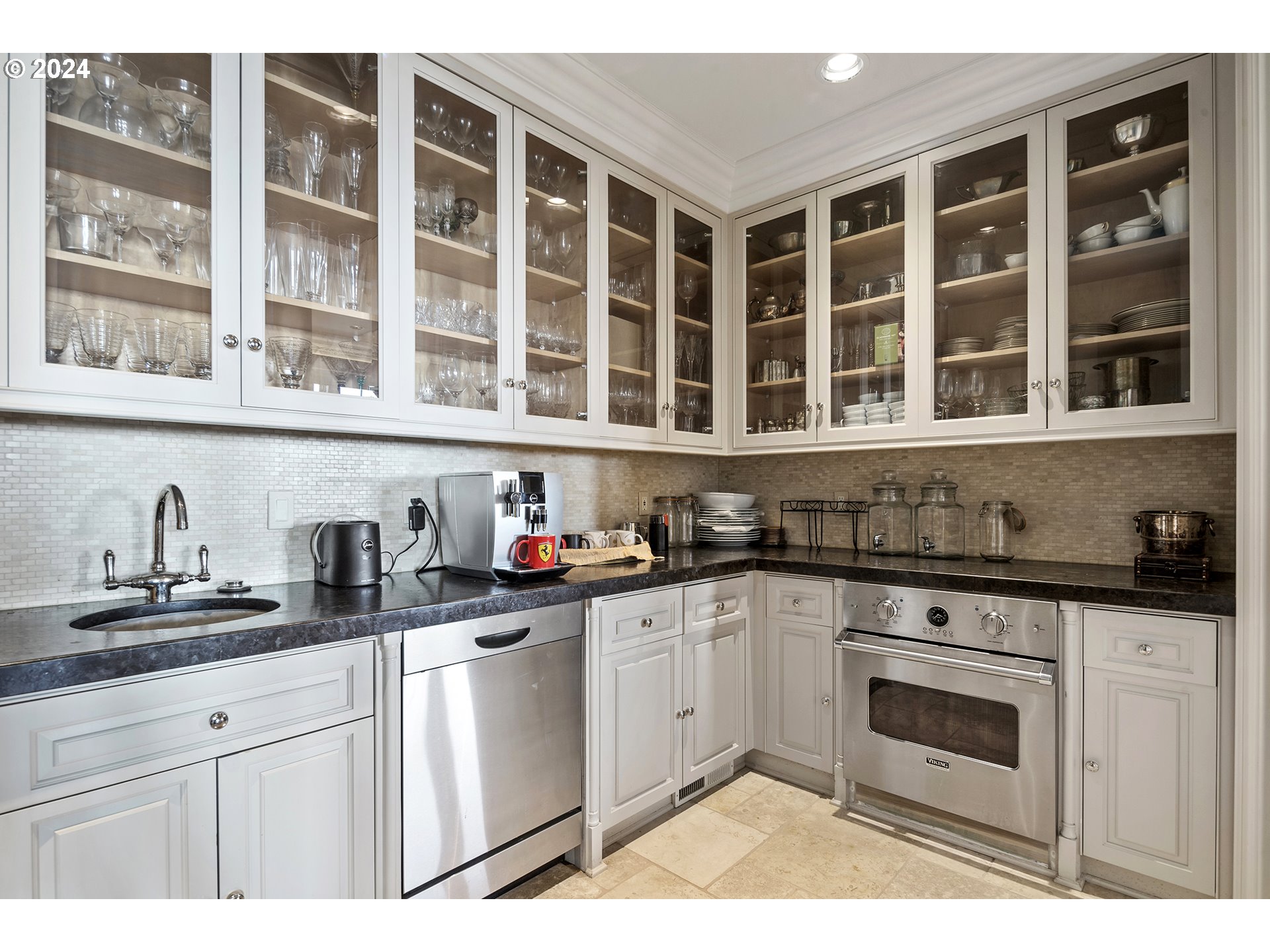 11223 Northwest Saltzman Road Portland, OR 97229 - Photo 21 of 46 a kitchen with granite countertop a stove sink and cabinets
