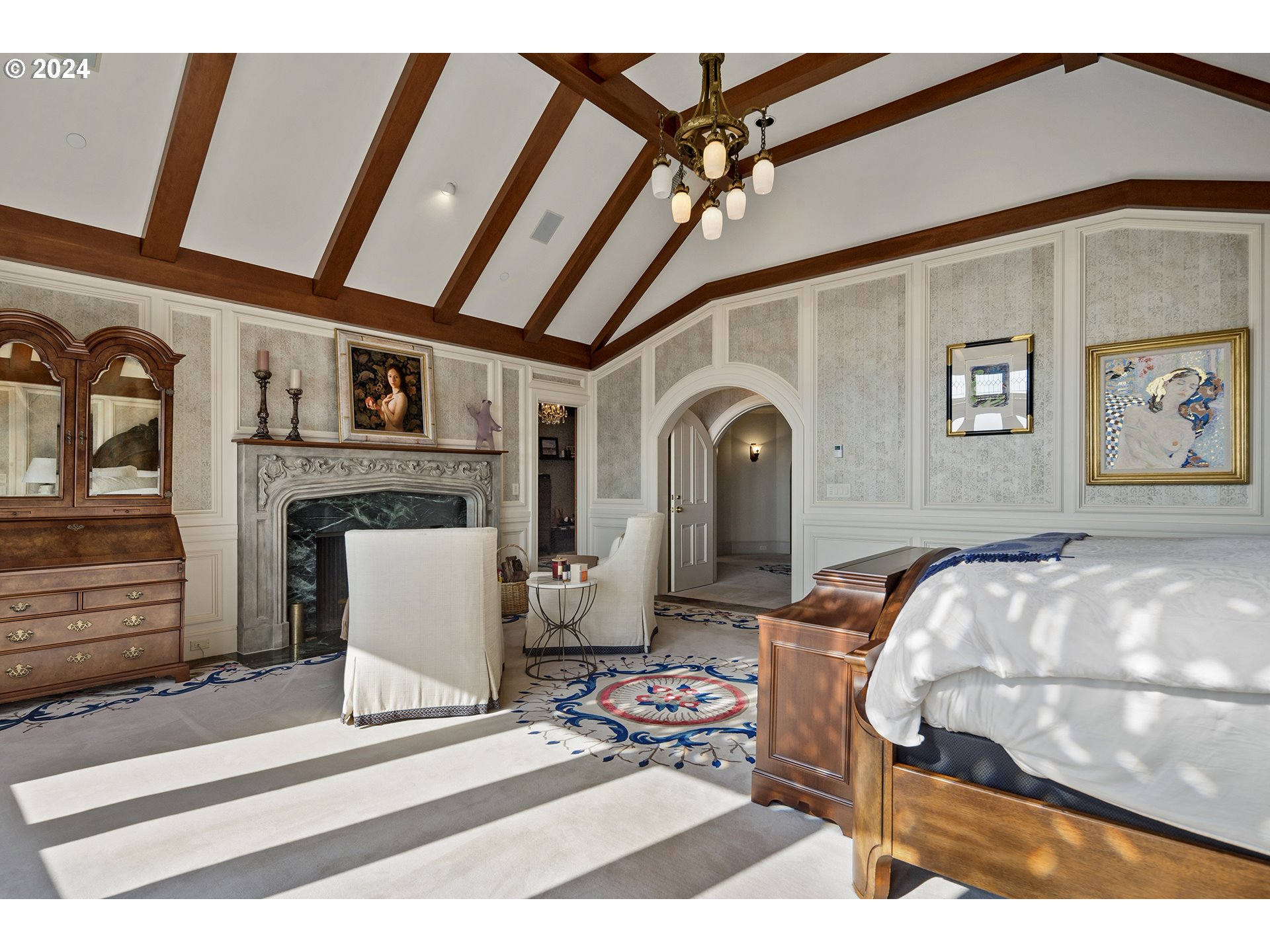 11223 Northwest Saltzman Road Portland, OR 97229 - Photo 27 of 46 a living room with furniture a fireplace and a flat screen tv