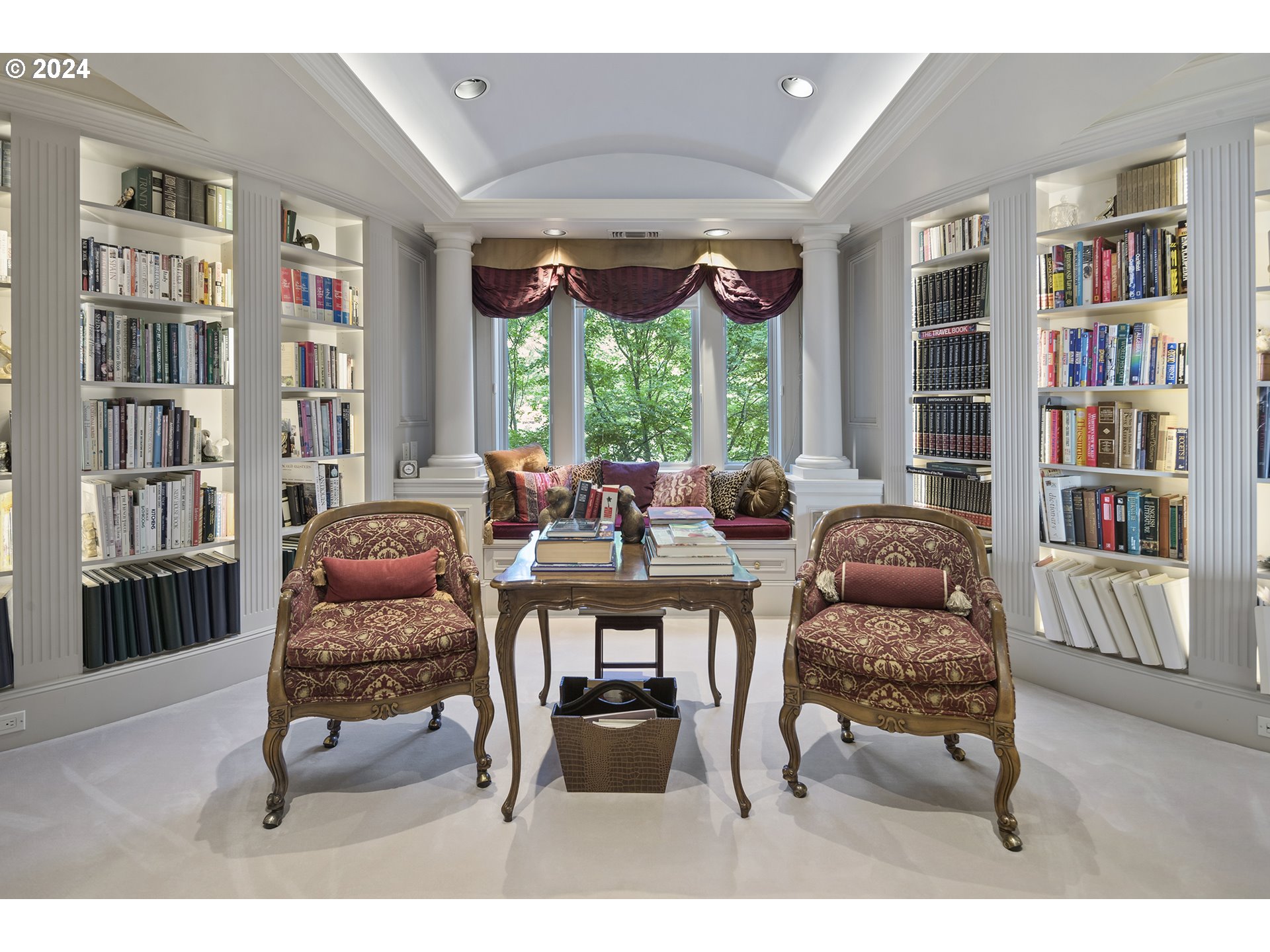 11223 Northwest Saltzman Road Portland, OR 97229 - Photo 30 of 46 a living room with furniture and a book shelf