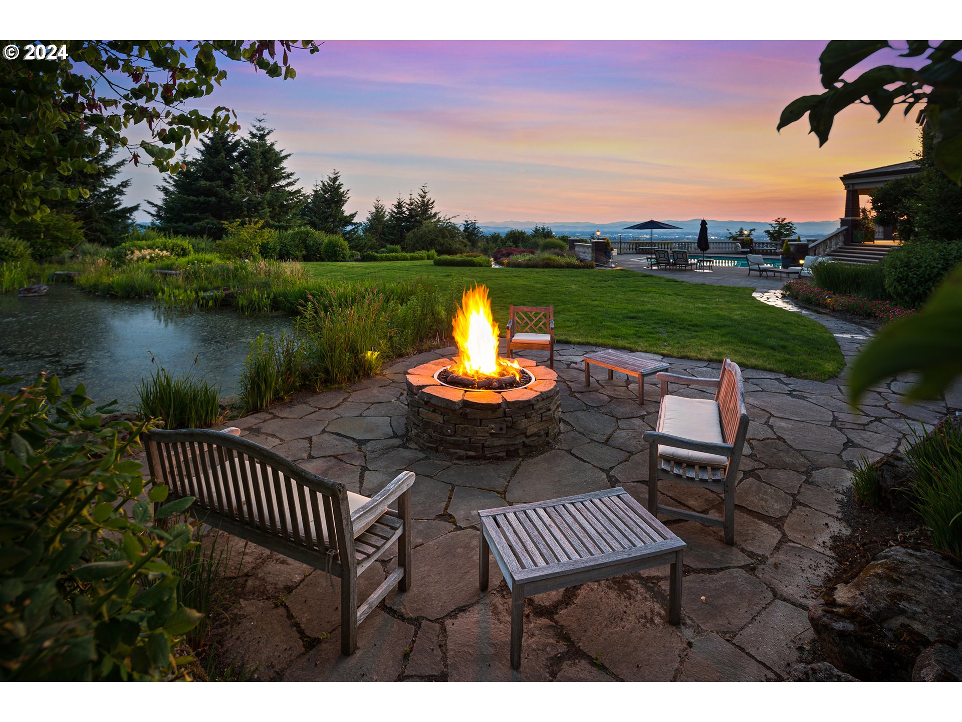 11223 Northwest Saltzman Road Portland, OR 97229 - Photo 8 of 46 a view of a table and chairs on the terrace