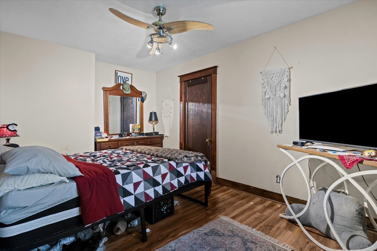 676 Mt Lebanon Road Dickson, TN 37055 - Photo 17 of 74 a bedroom with a bed and a flat screen tv