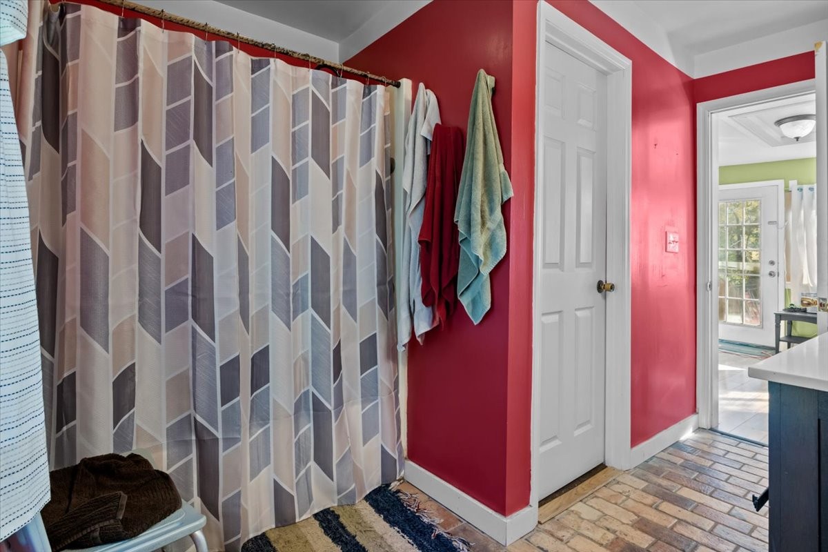 676 Mt Lebanon Road Dickson, TN 37055 - Photo 20 of 74 a view of a bedroom with wooden floor and walls
