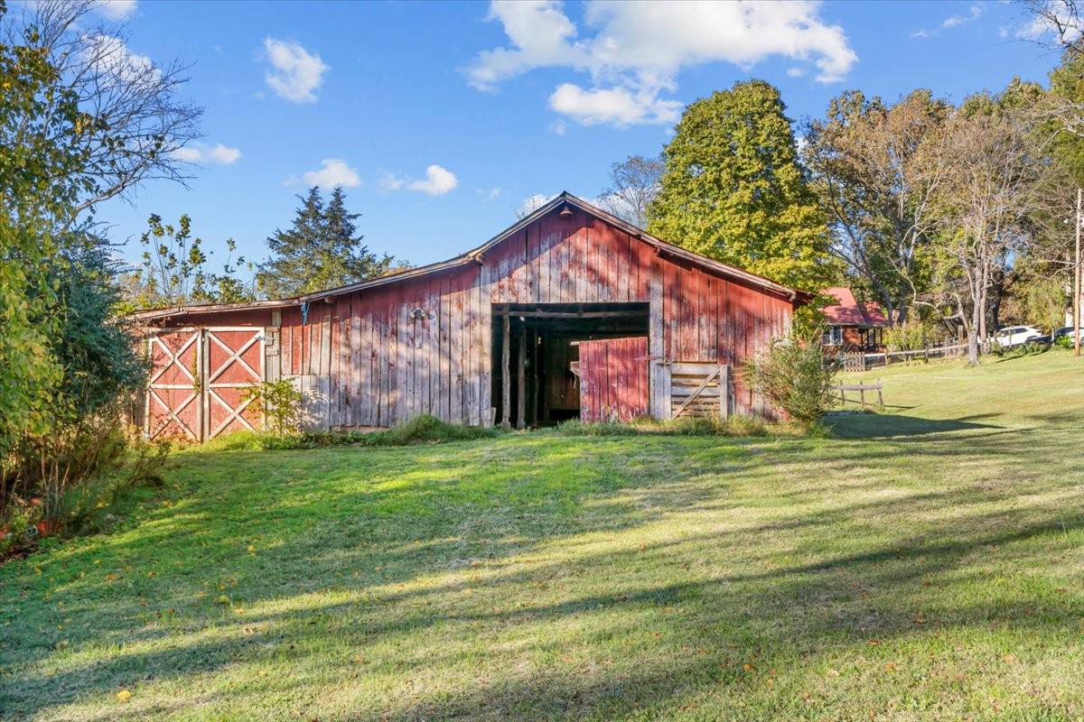 676 Mt Lebanon Road Dickson, TN 37055 - Photo 38 of 74 a front view of a house with garden