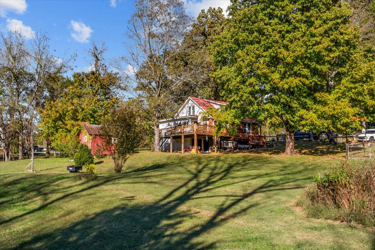 676 Mt Lebanon Road Dickson, TN 37055 - Photo 47 of 74 a view of a house with basketball court