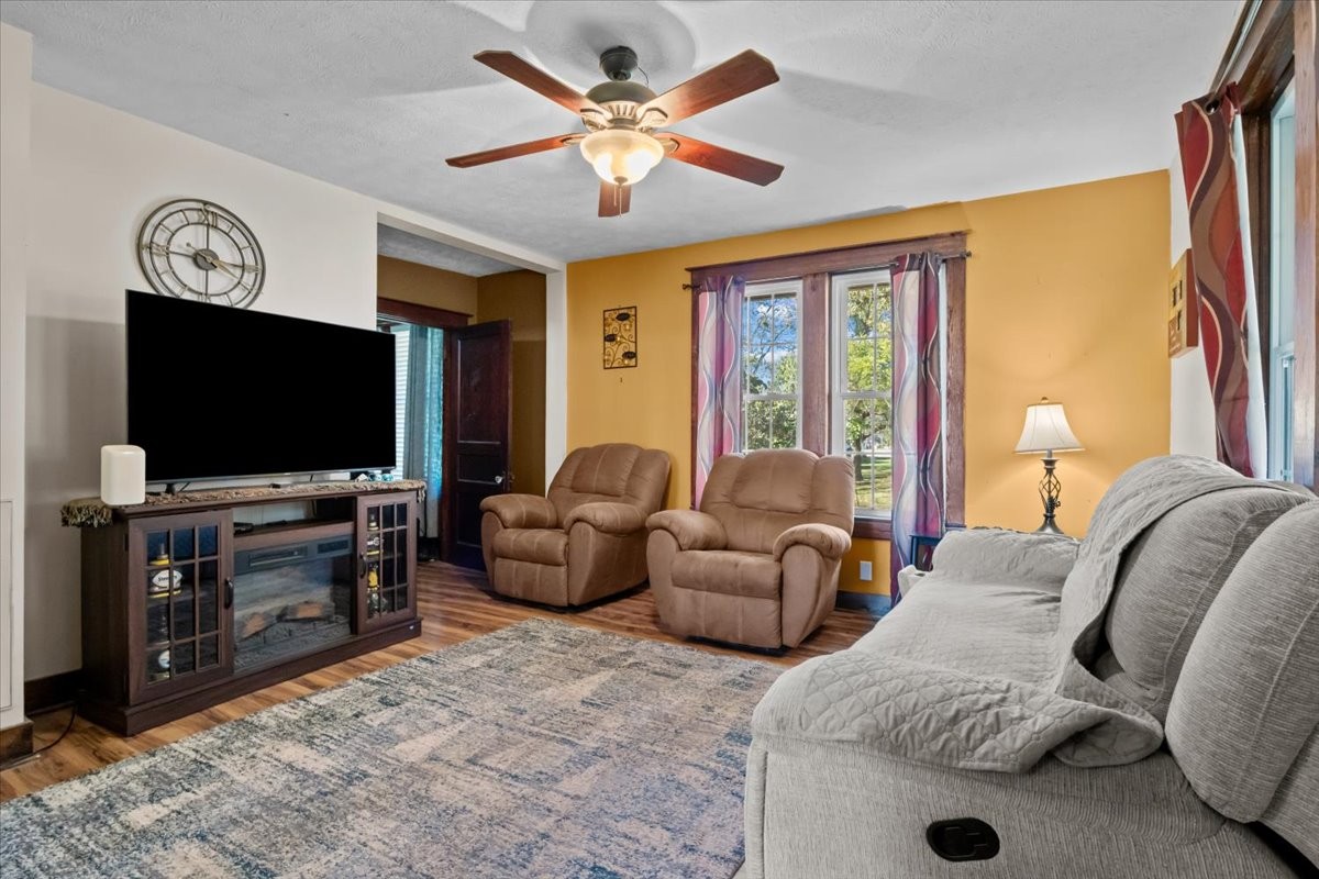 676 Mt Lebanon Road Dickson, TN 37055 - Photo 6 of 74 a living room with furniture and a flat screen tv