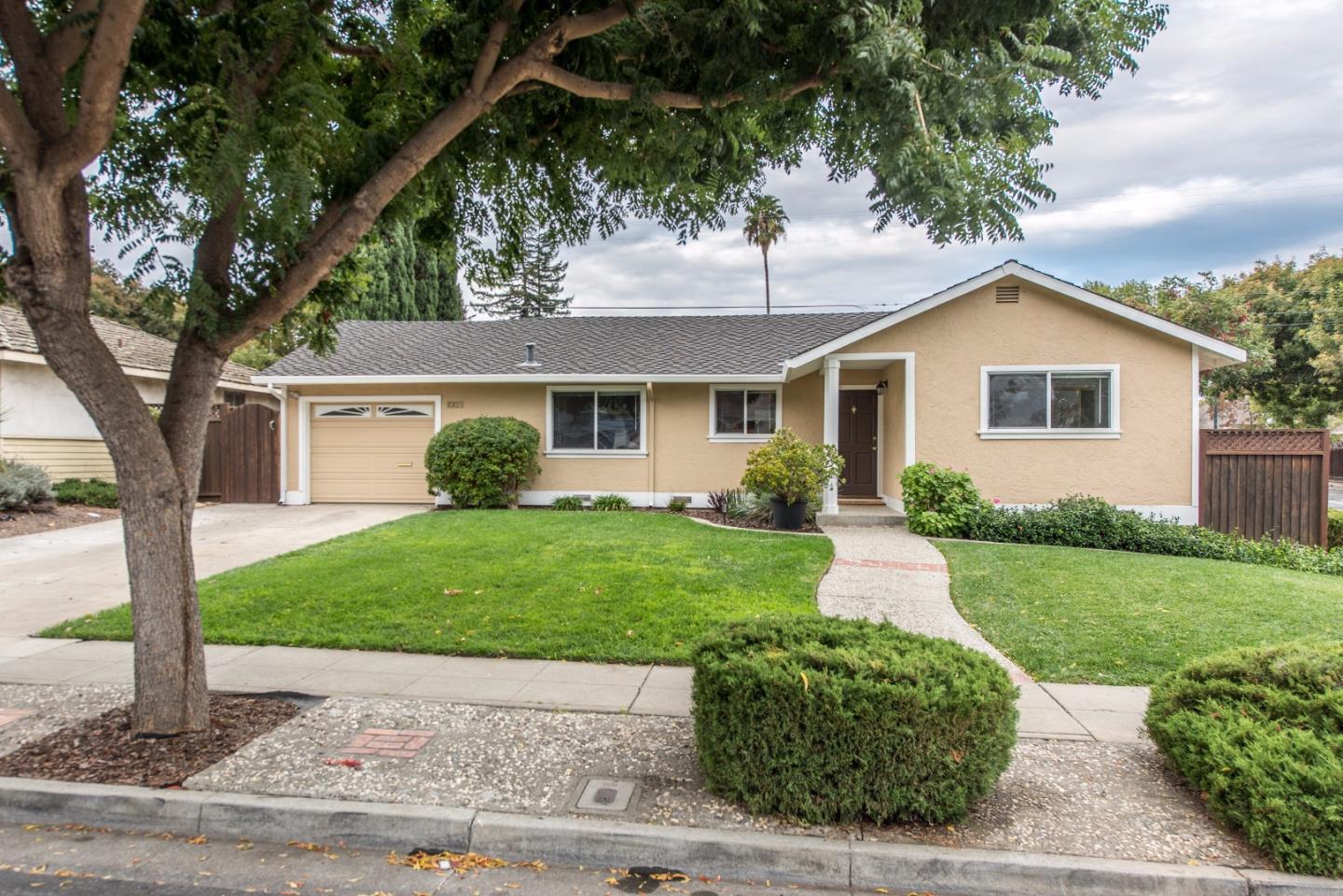 1003 Mango Avenue Sunnyvale, CA 94087 - Photo 1 of 23 a front view of a house with a yard