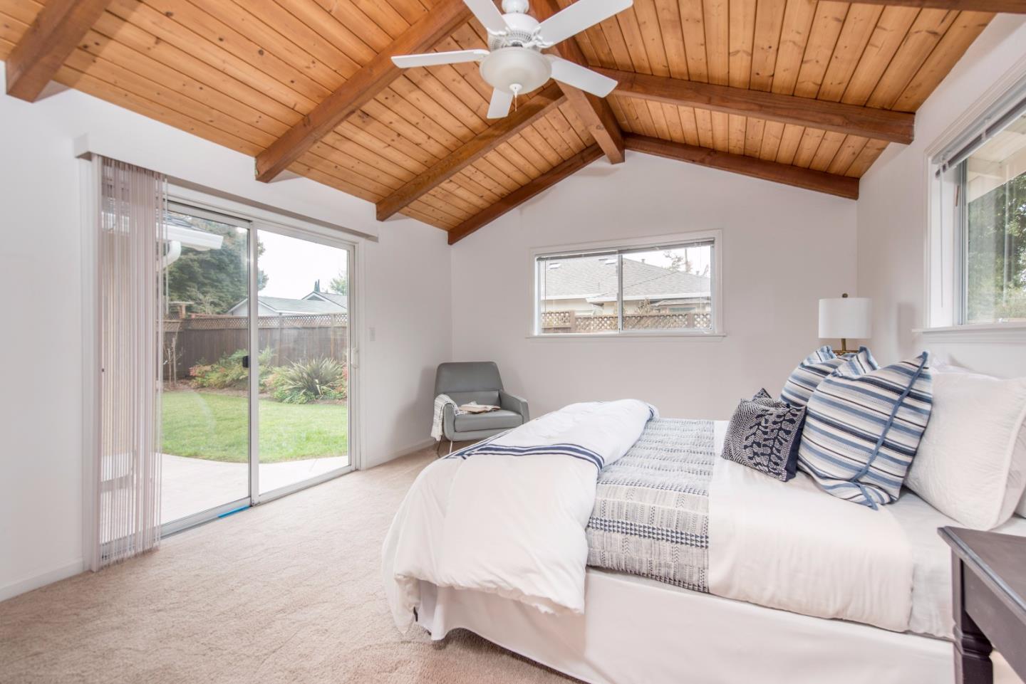 1003 Mango Avenue Sunnyvale, CA 94087 - Photo 11 of 23 a bedroom with furniture and a large window