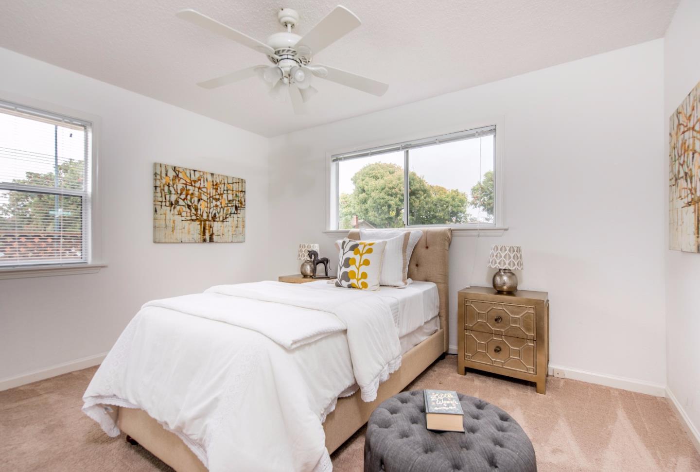 1003 Mango Avenue Sunnyvale, CA 94087 - Photo 13 of 23 a bedroom with a bed and a window