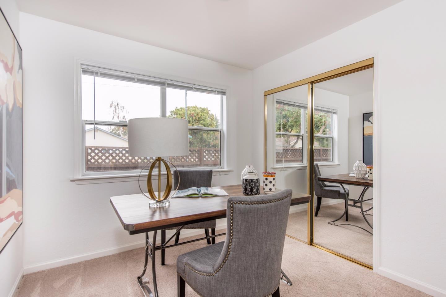 1003 Mango Avenue Sunnyvale, CA 94087 - Photo 15 of 23 a view of a dining room with furniture window and outside view