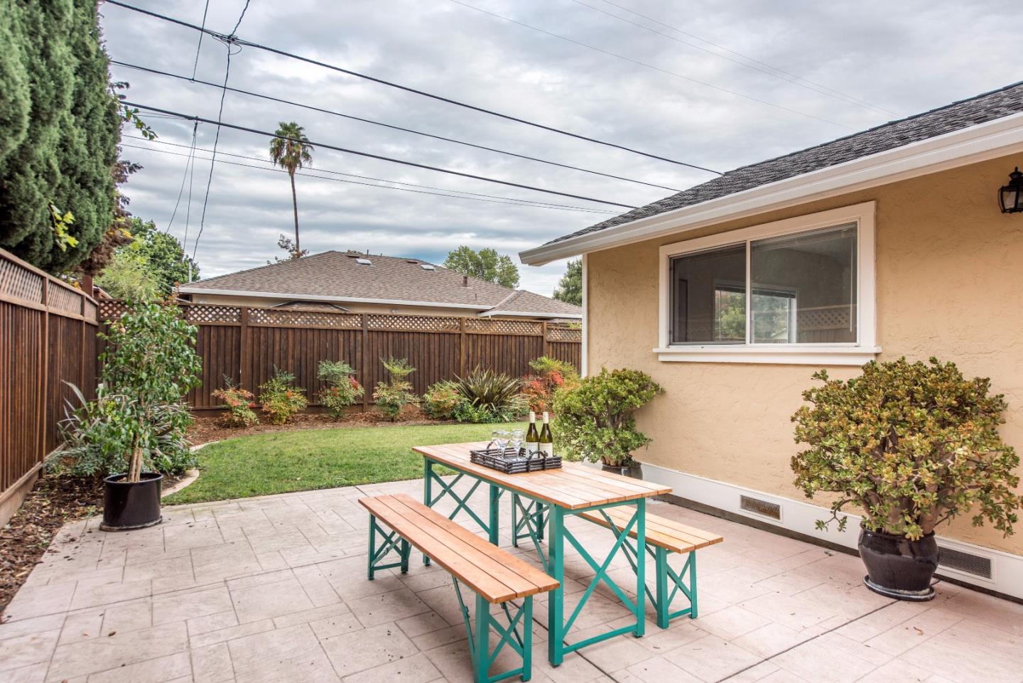 1003 Mango Avenue Sunnyvale, CA 94087 - Photo 18 of 23 a view of a house with backyard and garden