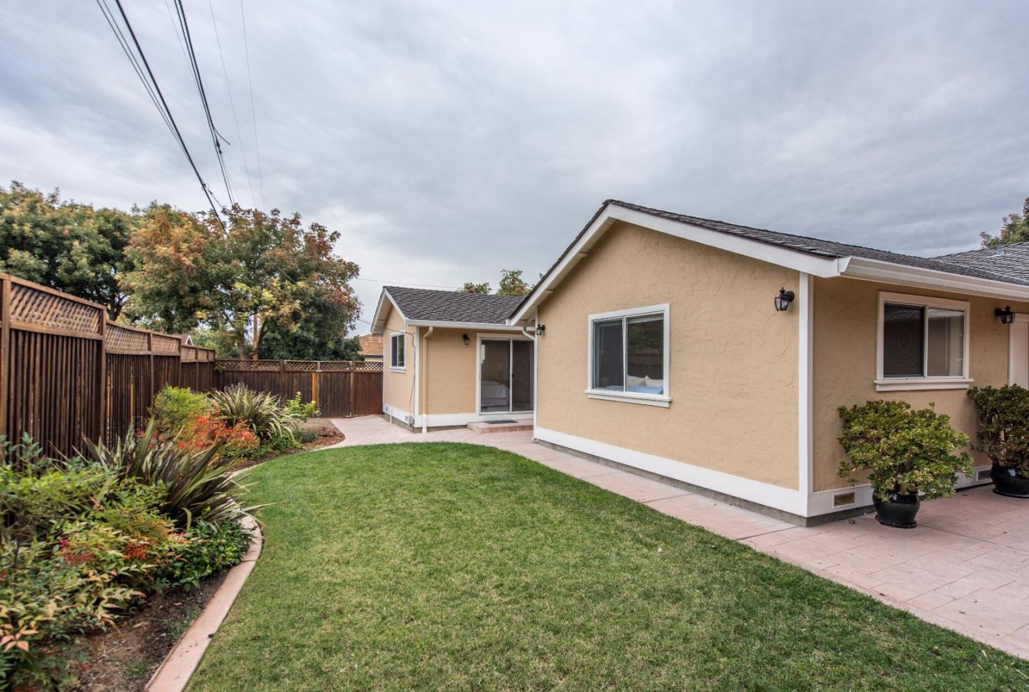 1003 Mango Avenue Sunnyvale, CA 94087 - Photo 20 of 23 a house view with a garden space